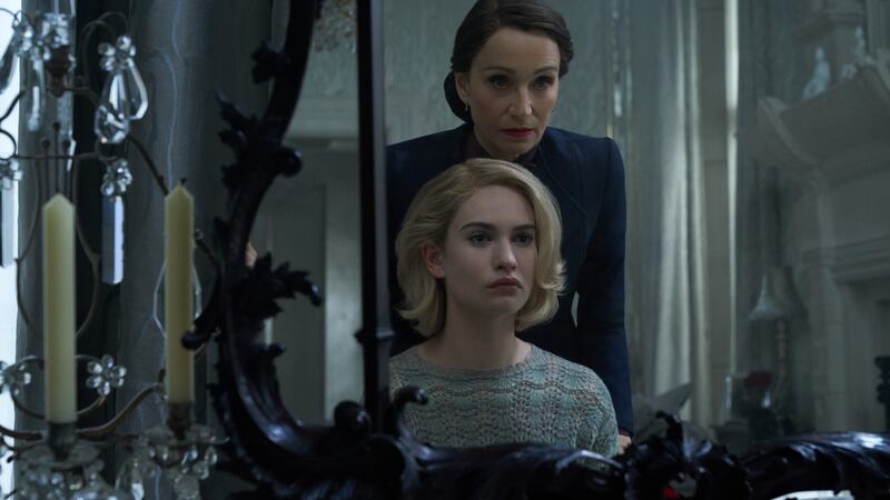 Lily James as Mrs. de Winter, Kristin Scott Thomas as Mrs. Danvers. Photograph: Kerry Brown/Netflix