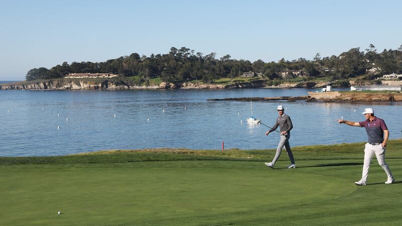 John Murphy and Séamus Power  walk on the fifth hole at Pebble Beach during the  AT&T Pebble Beach Pro-Am in February. Photograph:  Jamie Squire/Getty Images