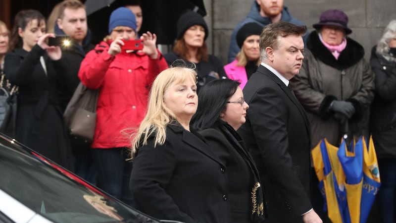 Dolores O’Riordan’s mother Eileen (front centre) and brother PJ as the singer’s remains arrive at St Joseph’s Church in Limerick on Sunday. Photograph: Niall Carson/PA