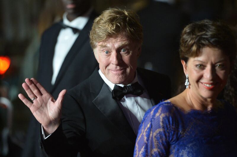 Robert Redford  in 2013 with his wife Sibylle Szaggars after attending the screening of the film 'All is Lost' in Cannes. Photograph:  Alberto Pizzoli/AFP/Getty