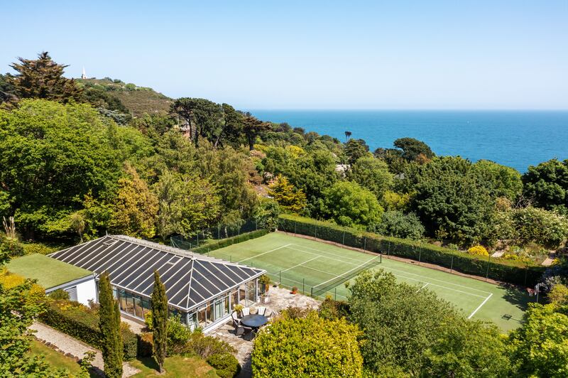 Indoor swimming pool lies in a pavilion adjacent to the tennis court