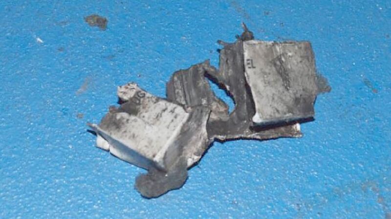 Bomb fragments from Manchester Arena show the 12-volt battery that was the possible power source of the bomb. Photograph: The New York Times
