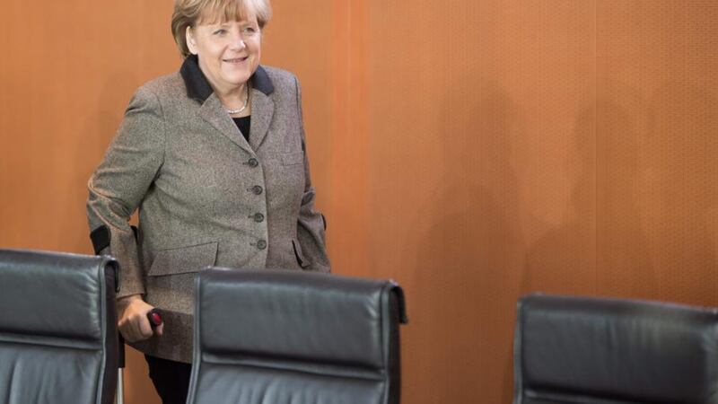 German Chancellor Angela Merkel, on crutches since a skiing accident at the end of December. Photograph: EPA/Joerg Carsten