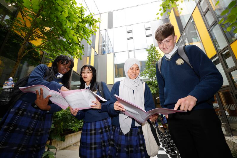 Students from Kishogue Community College in Lucan, chat to each other about their Leaving Cert exam papers last summer.  Photograph: Alan Betson

