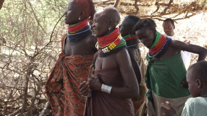 Turkana women and children dancing at a Mass being said by Catholic priest Fr Andrew Yakulula. Photograph: Bill Corcoran