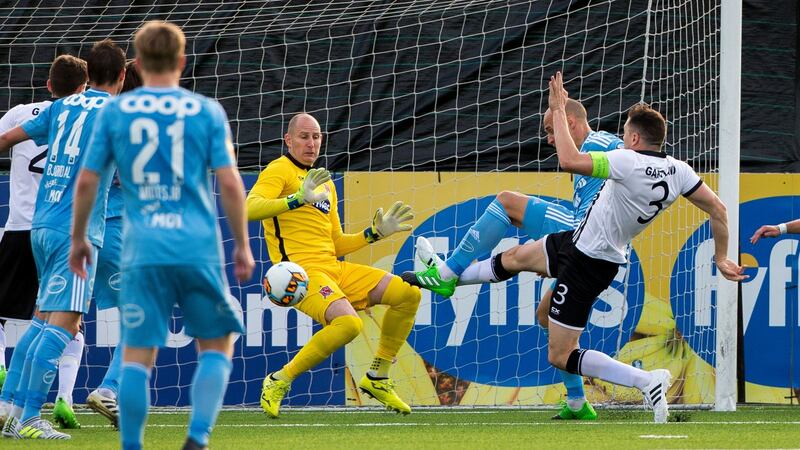 Rosenborg’s Tore Reginiussen gets his toe ahead of Gartland to score the equaliser. Photo: Liam McBurney/PA Wire