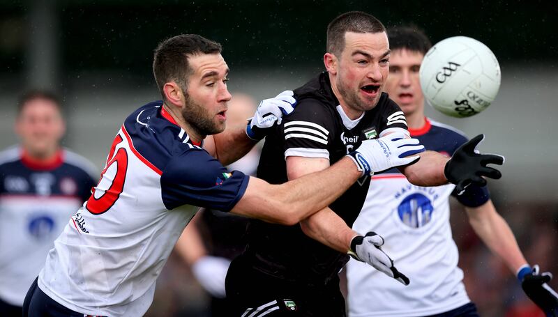 Sligo’s Paul Kilcoyne and Mark Ellis of New York in action in the Connacht SFC semi-final. Photograph: Ryan Byrne/Inpho