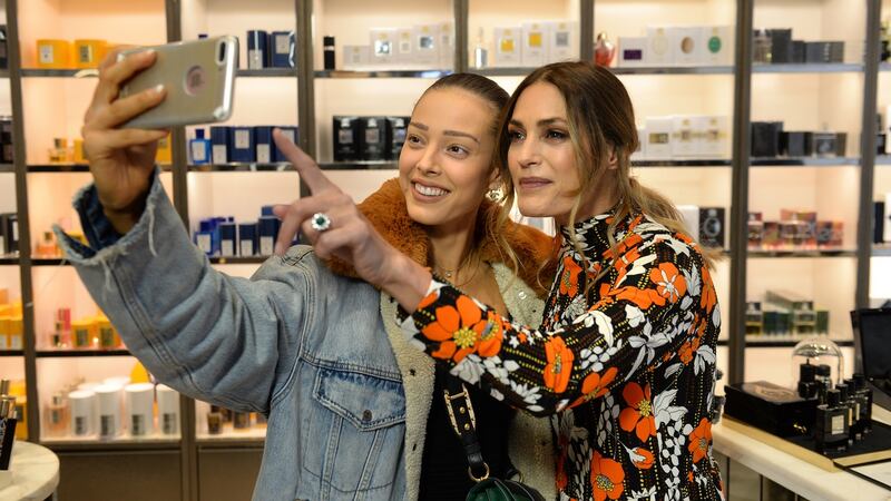 Yasmin Le Bon poses with fan Jessica Manina, from Enniskerry, Co Wicklow,  at an event in Dublin city centre. Photograph: Dara Mac Donaill