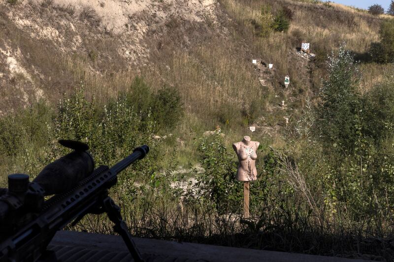 A bullet-riddled mannequin on shooting range used for sniper training in western Ukraine. Photograph: David Guttenfelder/New York Times