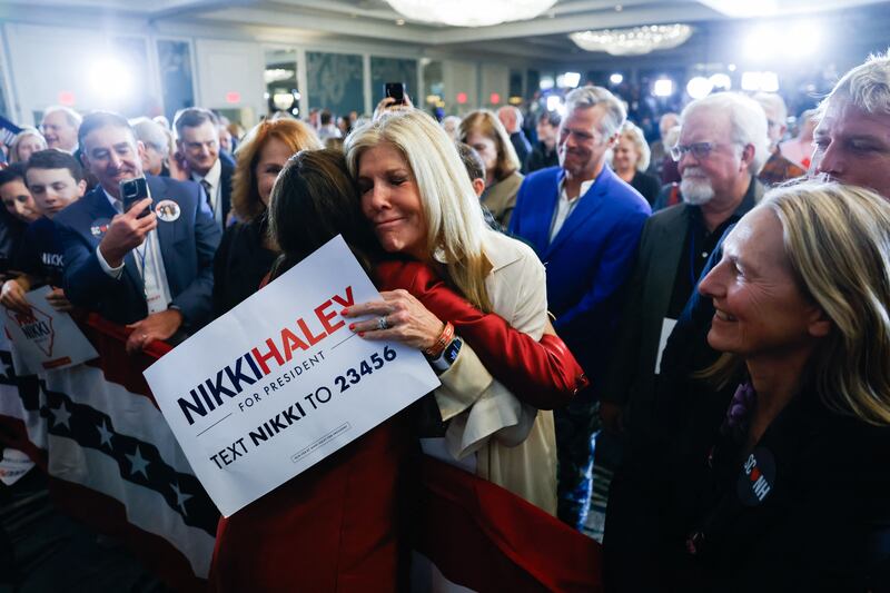 US Republican presidential hopeful Nikki Haley receives a supportive hug from a supporter after her loss had become clear at her election night watch party after the state primary elections in Charleston, South Carolina, on Saturday night. Photograph: Julia Nikhinson/AFP/Getty