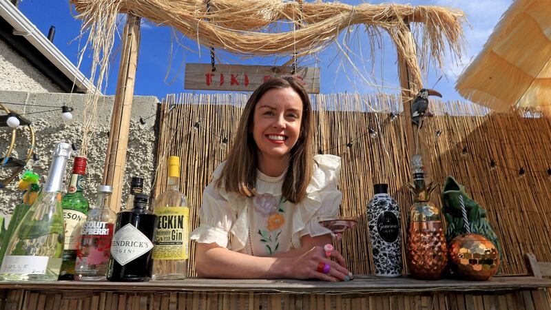 Katrina Carroll with her DIY tiki bar at her home in Walkinstown, Dublin. Photograph: Donall Farmer