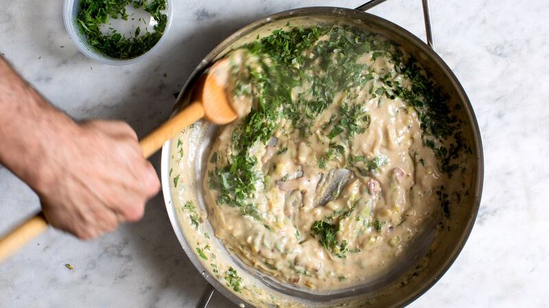 Herbs mixed into a  sauce for the fish pie