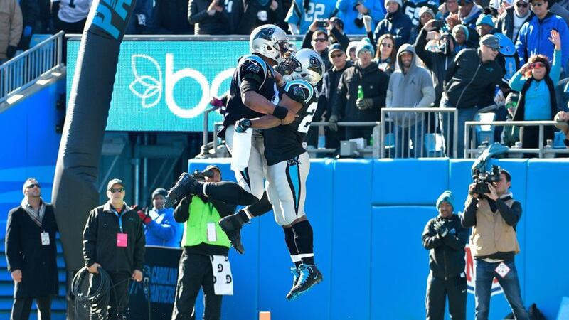 Jonathan Stewart and Cam Newton celebrate a touchdown in the Panthers’ win over the Vikings. Photograph: Grant Halverson/Getty