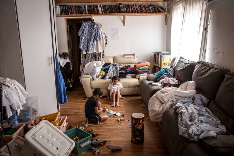 Two of Yehuda Shimon's children play in their home in the Chavat Gilad settlement in the occupied West Bank. Photograph: Sally Hayden