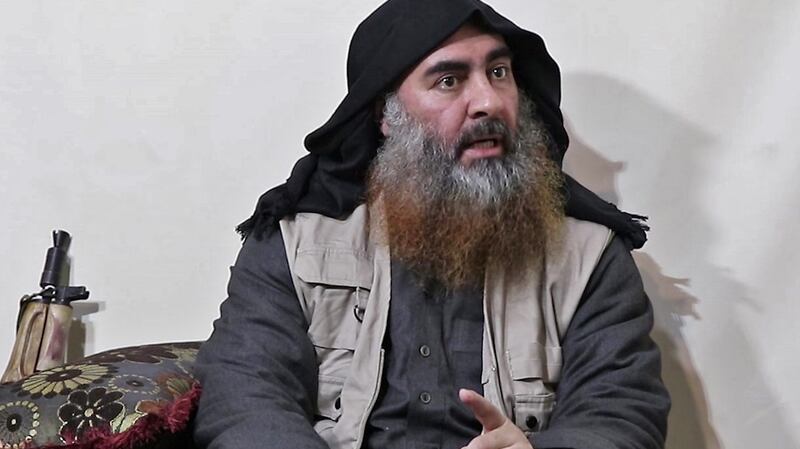 Islamic State chief Abu Bakr al-Baghdadi appears in video for the first time in five years, with an automatic rifle in the background. Screengrab: AFP/Getty