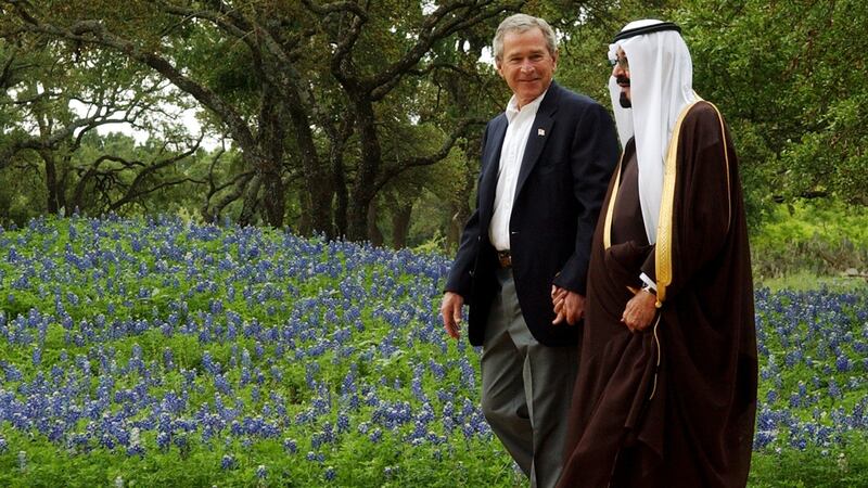 Taking it handy: former American president George W Bush escorts Saudi Crown Prince Abdullah. Photograph: Rod Aydelotte-Pool/Getty Images
