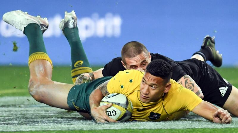 Israel Folau scores for Australia in the second half of their defeat to New Zealand. Photograph: Saeed Khan/AFP