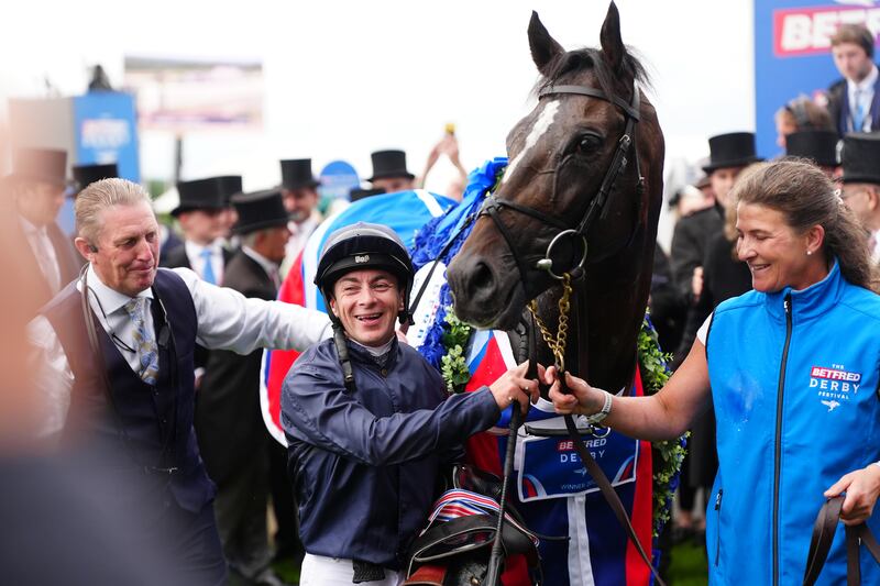 Jockey Wayne Lordan celebrates with Lambourn after the Derby win at Epsom. Photograph: David Davies for The Jockey Club/PA Wire