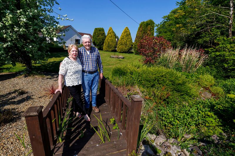 Mick Staunton with his wife Olivia in their garden in Castlerea. Photograph: Arthur Ellis