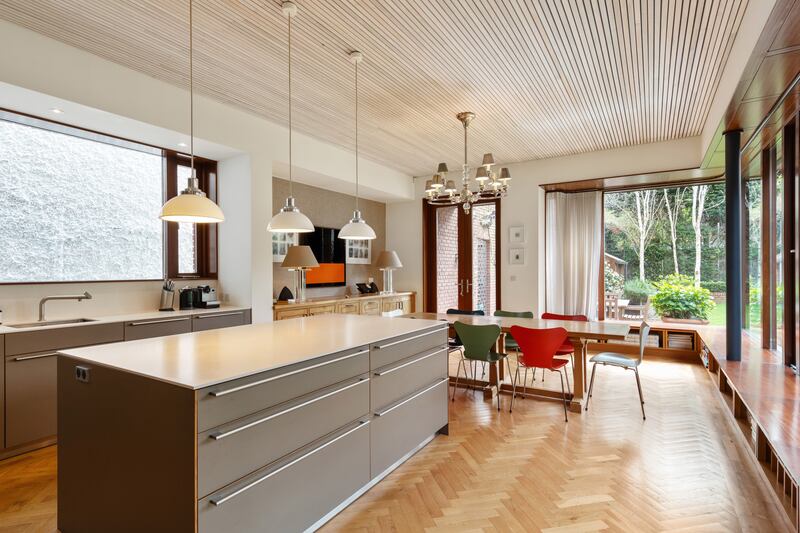Kitchen with bench under windows