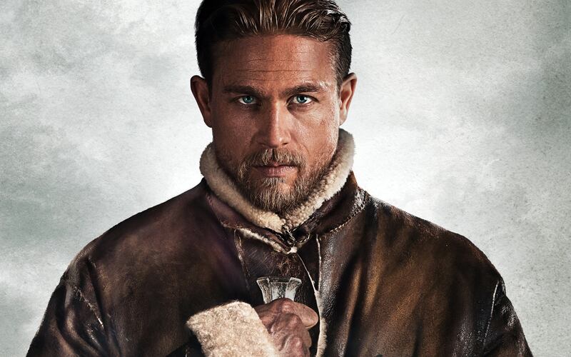 Charlie Hunnam as King Arthur in a promotional still from Guy Richie's reboot