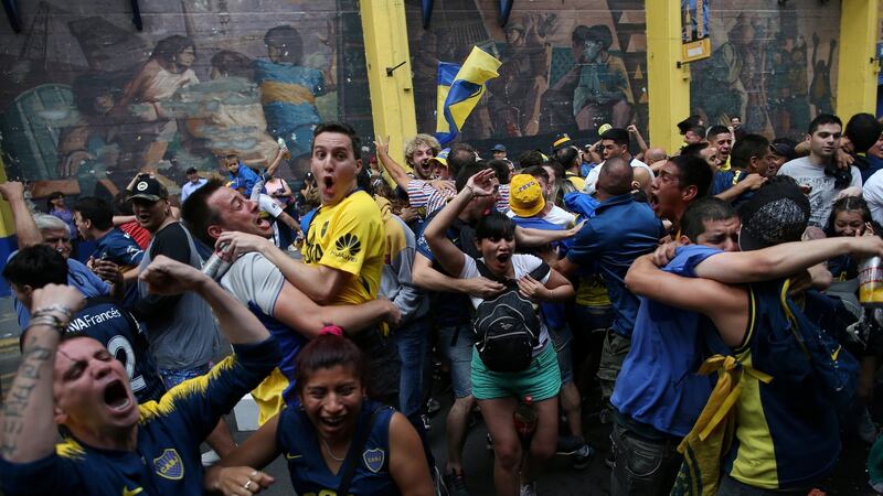 Boca Juniors fans in Buenos Aires celebrate their first goal. Photo: Agustin Marcarian/Reuters