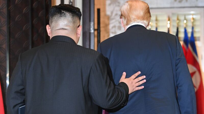 “Nice to meet you, Mr President,” said Mr Kim, in English. Photograph: Saul Loeb/AFP/Getty Images