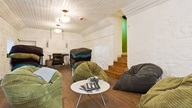 Elbowroom Escape: many sit around with tea and just talk together