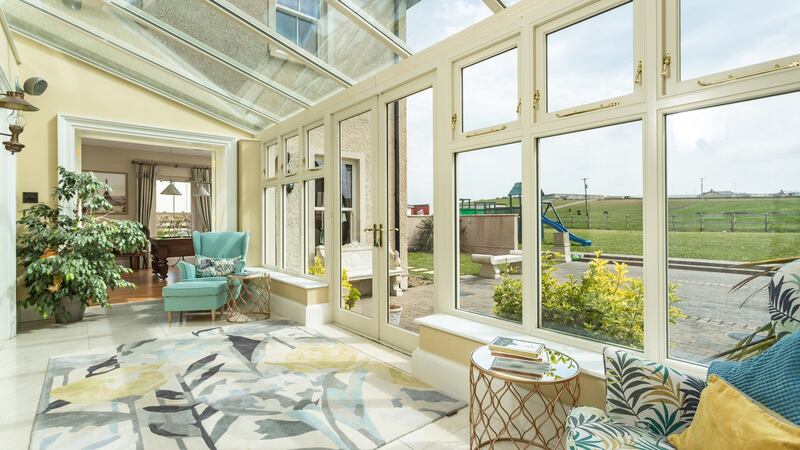 The decor with pale neutrals allows the maritime vistas to take centre stage