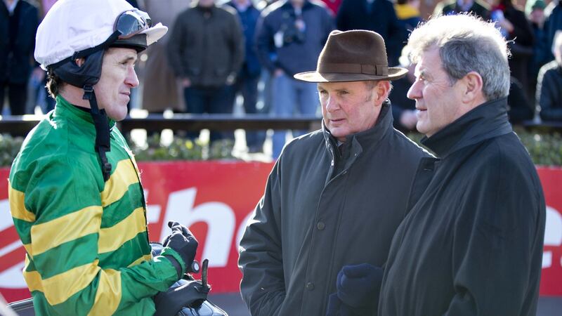 Frank Berry (centre) with McManus and AP McCoy Photograph: Morgan Treacy/Inpho