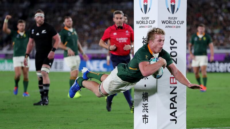 Pieter-Steph du Toit of South Africa dives to score a try in the second half. Photograph:  Mike Hewitt/Getty Images