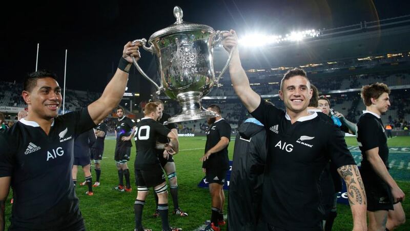 Malakai Fekitoa (left) and TJ Perenara of New Zealand celebrate with the Bledisloe Cup   at Eden Park in Auckland. Photograph: Nigel Marple / Reuters