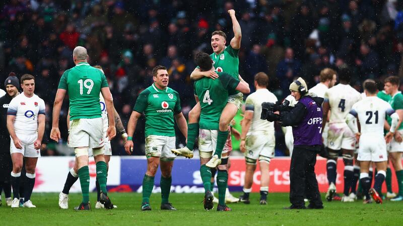 James Ryan celebrates with Jordan Larmour celebrate after clinching the Grand Slam with victory at Twickenham on Saturday. Photograph: Dan Sheridan/Inpho
