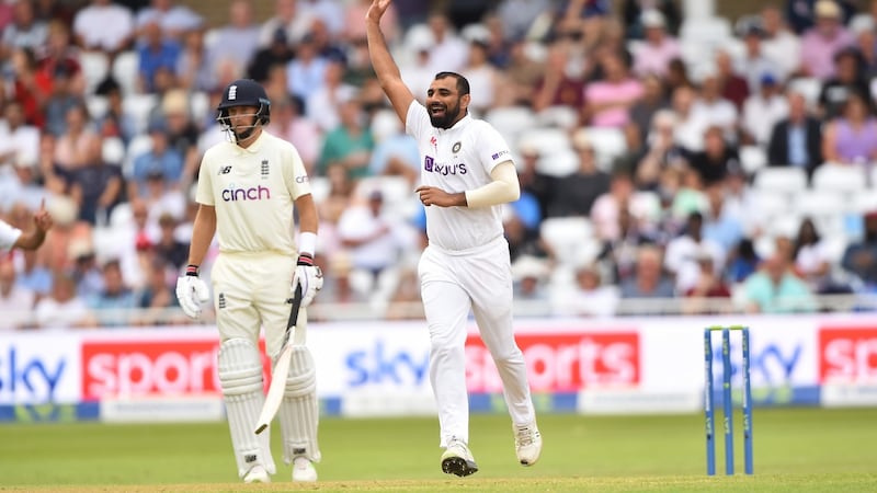 Mohammed Shami of India celebrates after taking the wicket of Dan Lawrence. Photograph: Nathan Stirk/Getty
