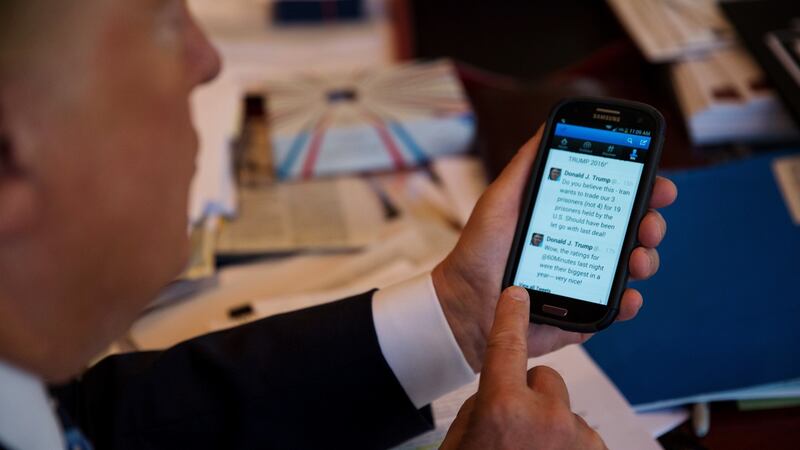 Donald Trump uses  Twitter  on his  smartphone.  Since he reshuffled his campaign’s leadership in August, his team has tried to instill a more disciplined approach. Twitter, however, has continued to be an outlet for him  to vent without a filter. Photograph: Josh Haner/The New York Times