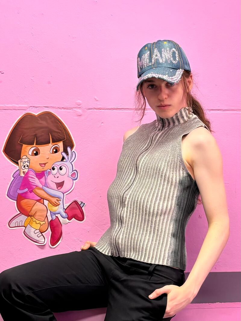 D Connor Petrin: 'This metallic top is from Zara and the hat was bought in the Navigli Canal in Milan'