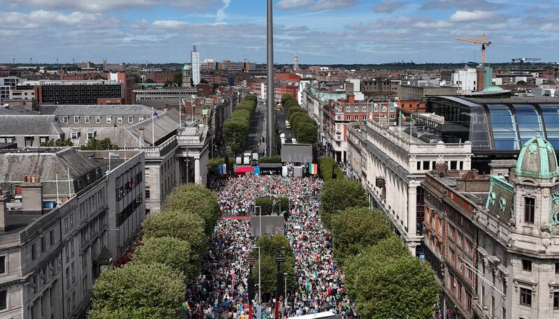 Thousands of people gathered along Dublin's main thoroughfare to celebrate the homecoming by Irish Olympians. Photgraph: Niall Carson/PA