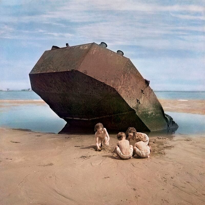 David Seymour’s photograph of children at play beside abandoned landing craft on the  beaches of Normandy, 1947 in  Magnum Manifesto, Thames & Hudson (2017).