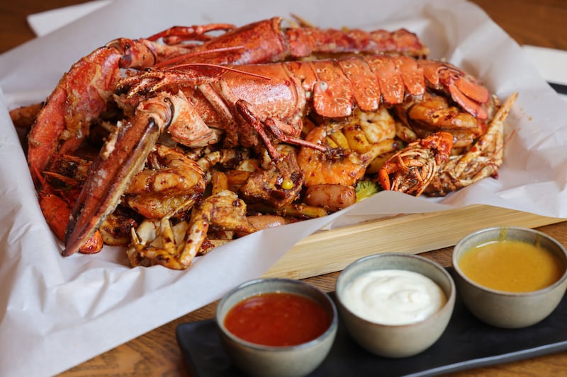 Holy Crab Supreme: lobster, swimming crab, crayfish, prawn, octupus, squid, clams, mussel fish cake, corn, potato, broccoli, rice cake and sausage. Photograph: Alan Betson