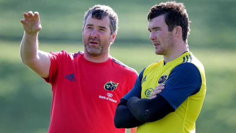Peter O’Mahony with Anthony Foley during a Munster training session in 2013. Photo: Dan Sheridan/Inpho