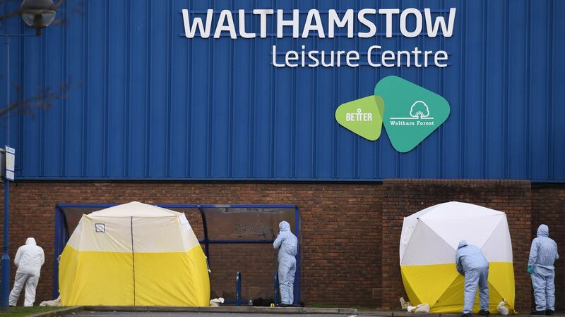 Forensic officers at the scene where a 16-year-old boy was shot on Monday evening and left in a critical condition in Markhouse Road in Walthamstow, east London. Photograph: Stefan Rousseau/PA Wire.