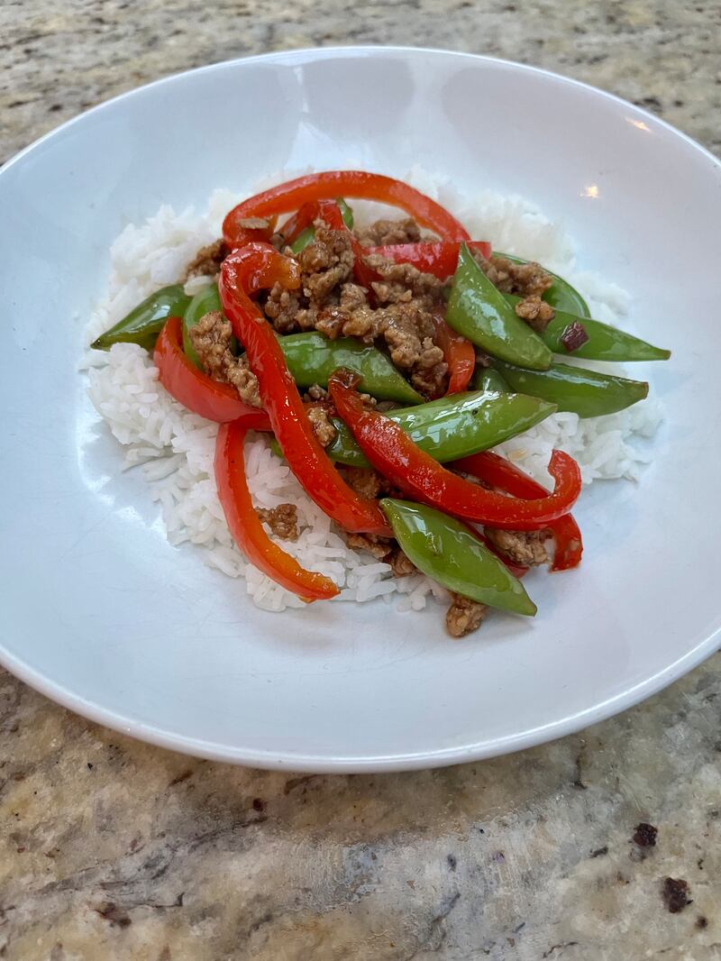 Sugar snap stir-fried pork with fluffy rice and fried peppers from HelloFresh