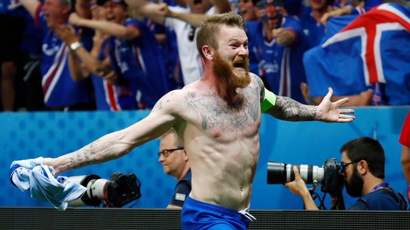 Iceland’s Aron Gunnarsson celebrates after the game. Photo: Michael Dalder/Reuters
