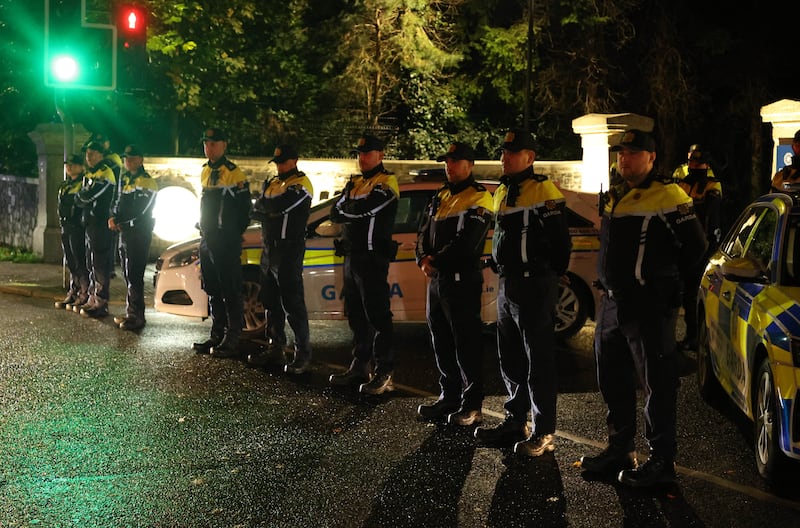 Gardaí form a cordon across the entrance to the former Citywest Hotel on Monday night as a small group of protesters remonstrate after an earlier alleged incident. Photograph: Colin Keegan/Collins