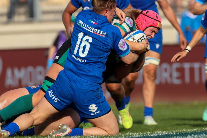 Ireland's Dorothy Wall on her way to scoring a try. Photograph: Tom Maher/Inpho