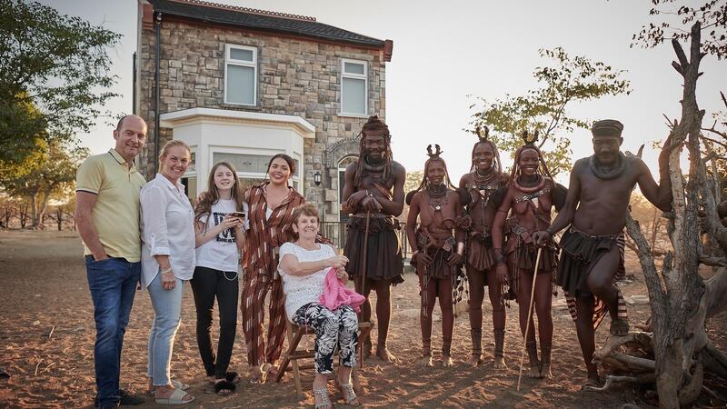 Scarlett Moffatt (fourth from left) with family and neighbours in The Tribe Next Door