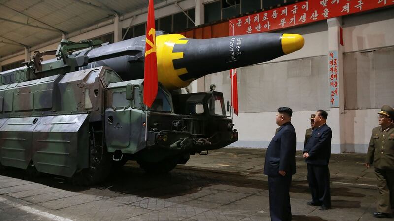 Kim Jong-un inspecting ballistic rocket Hwasong-12. Photograph: STR/AFP/Getty Images