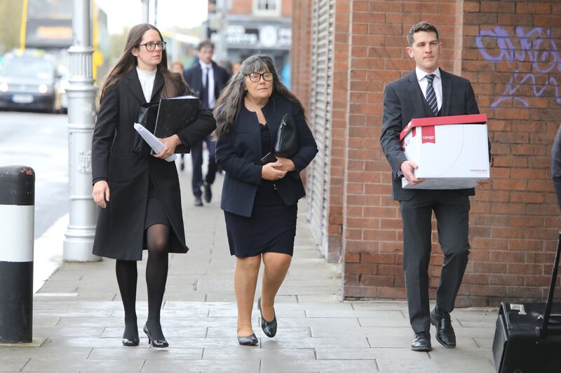 Enoch Burke's sister Ammi, mother Martina, and brother Isaac arriving at the High Court in Dublin on Tuesday for his defamation action. Photograph: Collins Courts  