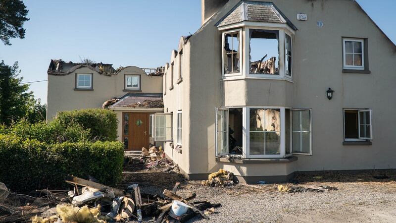 The house destroyed by fire at Kiltimagh, Co Mayo. The blaze caught hold on Friday afternoon last after flaming embers carried on the wind from roadside trees landed on the roof.  Photograph: Keith Heneghan/Phocus