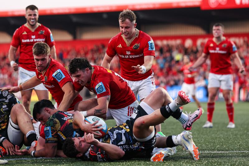 Munster's Calvin Nash and Craig Casey celebrate after Lee Barron scores their side's second try against Benetton at Virgin Media Park, Cork on May 16th. Photograph: Ben Brady/Inpho